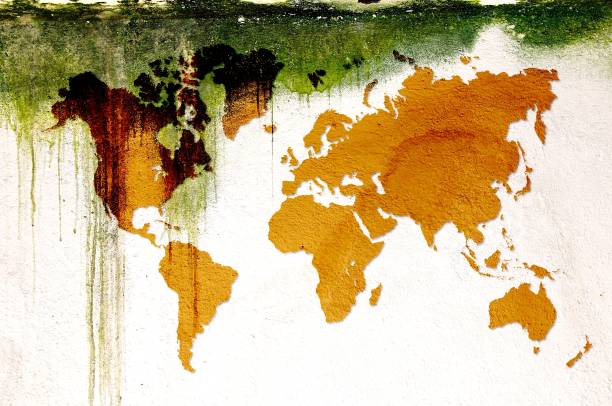 istock Grunge sepia dripping world map on mossy concrete wall. 861595850