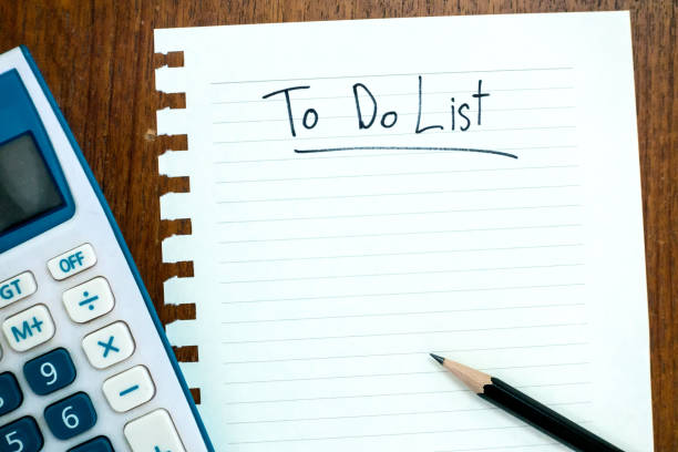 istock top view of work desk with writing to do list 861595882