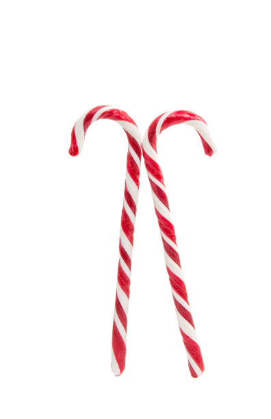 istock Christmas decoration. Traditional holiday candy cane isolated on white. 861595918