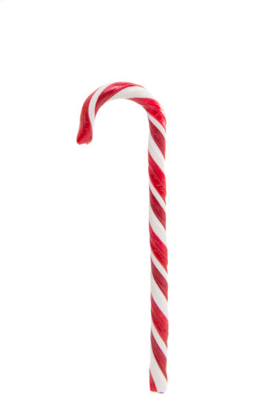 istock Christmas decoration. Traditional holiday candy cane isolated on white. 861596000