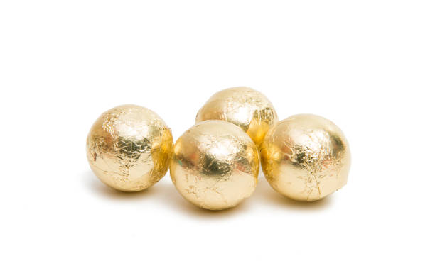 istock Chocolate candies in foil isolated 861599996