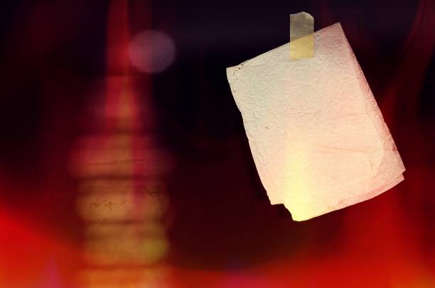 istock Crumple paper sheet on red and black background. 861600710