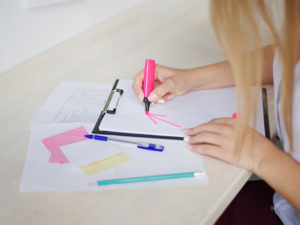 istock The girl is making notes at the office 861607304