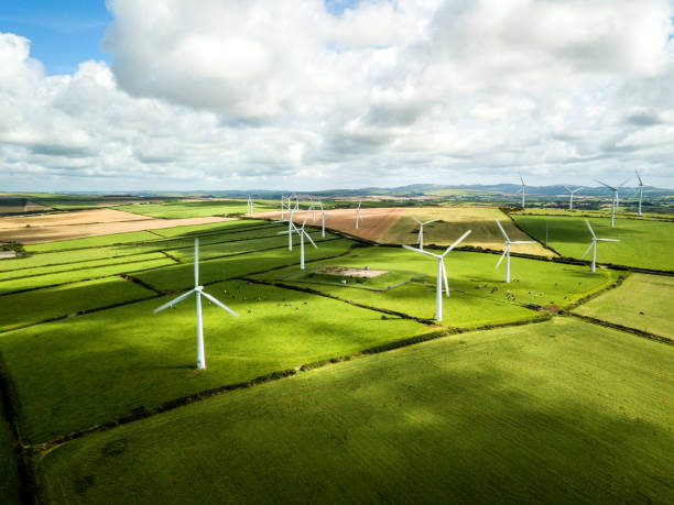 Wind turbine fields in Cornwall Wind turbine fields in Cornwall helicopter point of view photos stock pictures, royalty-free photos & images