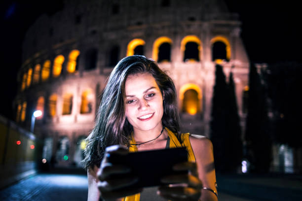 istock Smiling young woman taking selfie in Rome 861618362