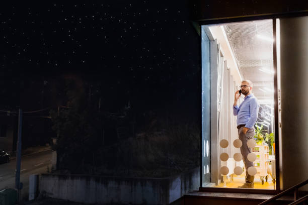 istock Businessman in the office at night working late. 861632322
