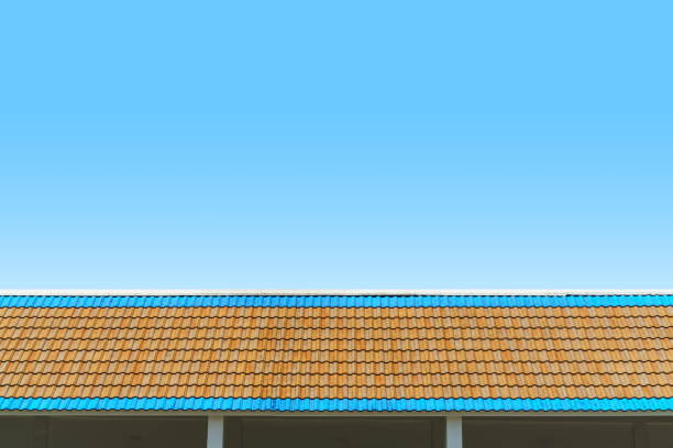 istock Temple wall and tiled roof with clouds and blue sky. 861634720