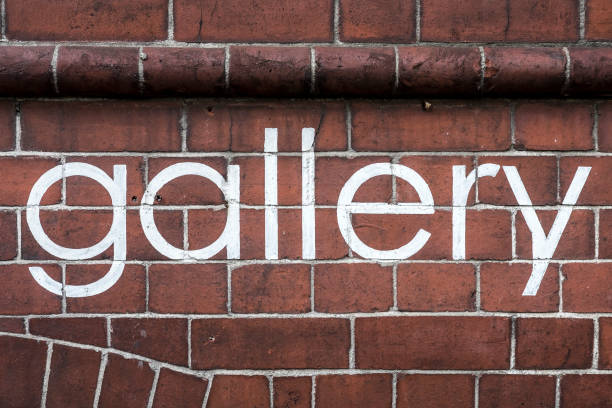 istock The word 'gallery' written in neat paint, on a brick wall. 861635258