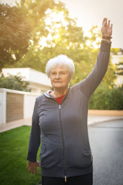 istock Smiling senior woman having exercise in city park. 861638698