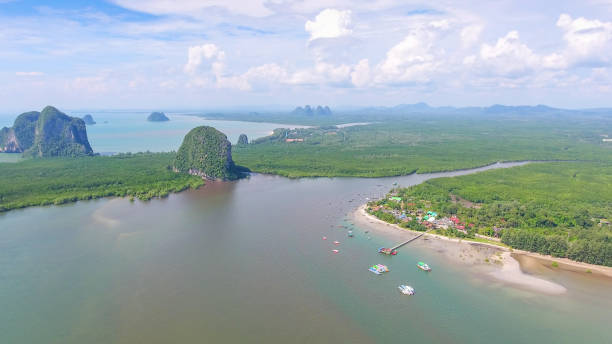 istock Aerial shot at tropical sea with long tail boat in south thailand 861652182