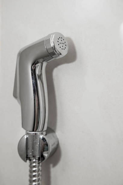 istock Bidet shower on the wall 861654962