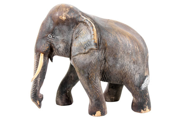 istock Elephant wood carving isolated on white background 861655020