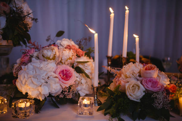 istock Table decor with white flowers and candles for a wedding party 861655328