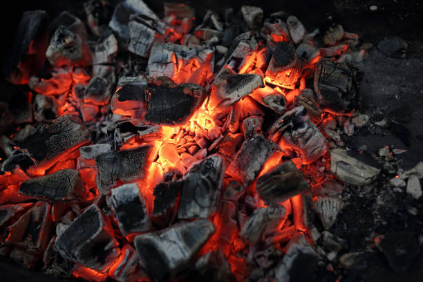 charcoal for barbecue - flaming hot imagens e fotografias de stock