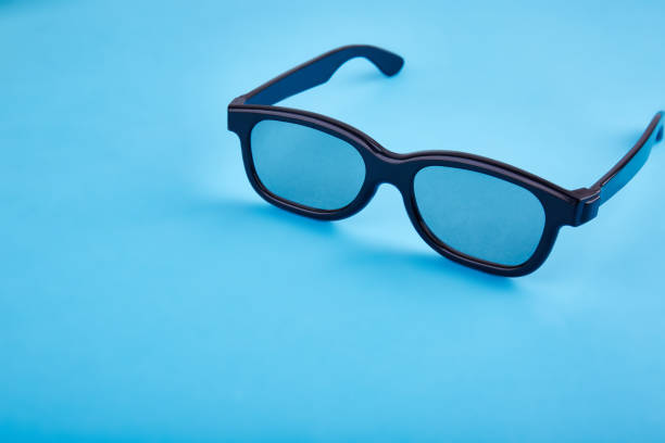 istock A 3D glasses on the background of a wooden table 861668020