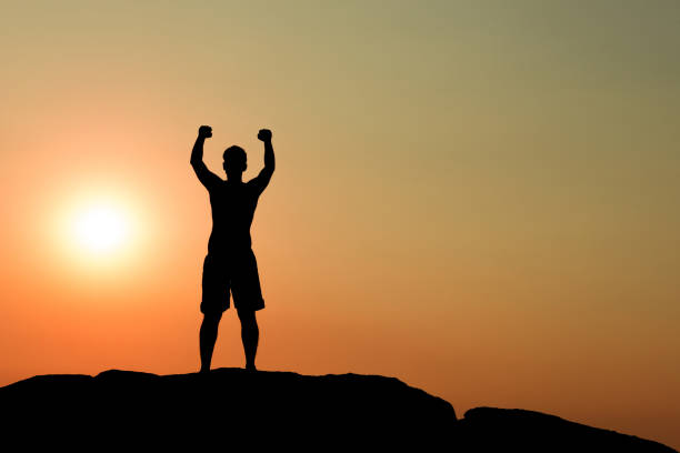 istock Silhouette of half naked confident man 861681412