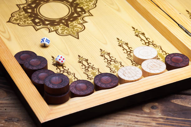 istock The game backgammon on the wooden table 861688410