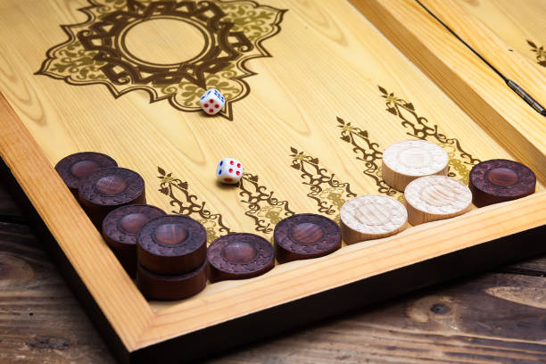 istock The game backgammon on the wooden table 861688420