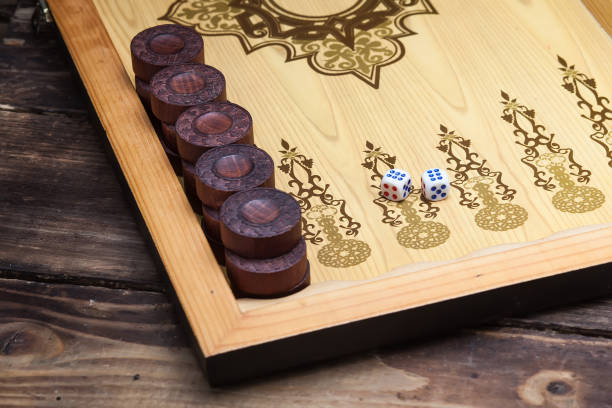 istock The game backgammon on the wooden table 861688424