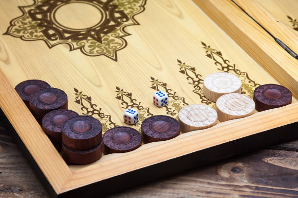 istock The game backgammon on the wooden table 861688426
