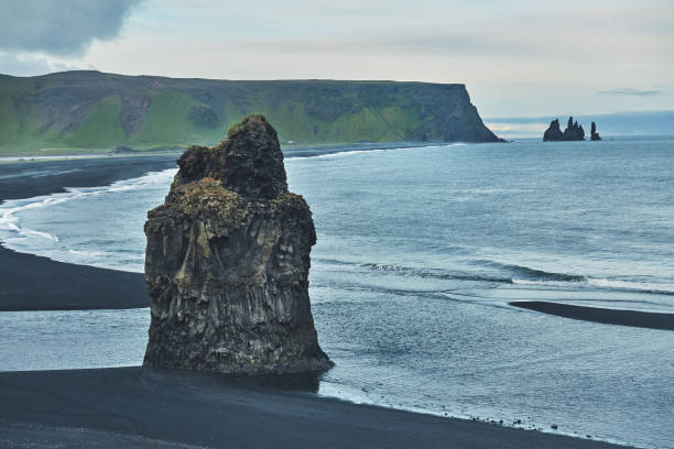 istock Kirkjufjara black sand beach, southern Iceland 861691216
