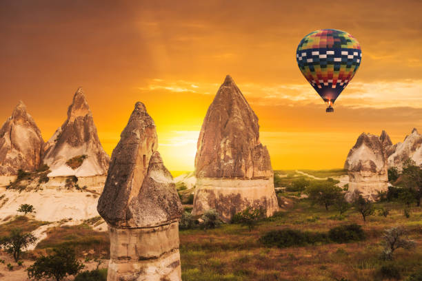 Hot air balloon flying over Cappadocia region, Turkey