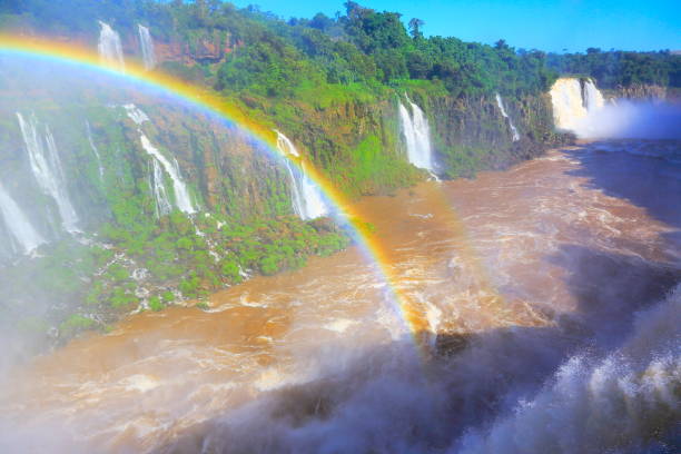 istock Impressive Iguacu falls landscape with rainbow, dramatic beauty in nature landscape - Idyllic Devil's Throat - international border of Brazilian Foz do Iguacu, Parana, Argentina Puerto Iguazu, Misiones and Paraguay - South America 861692948