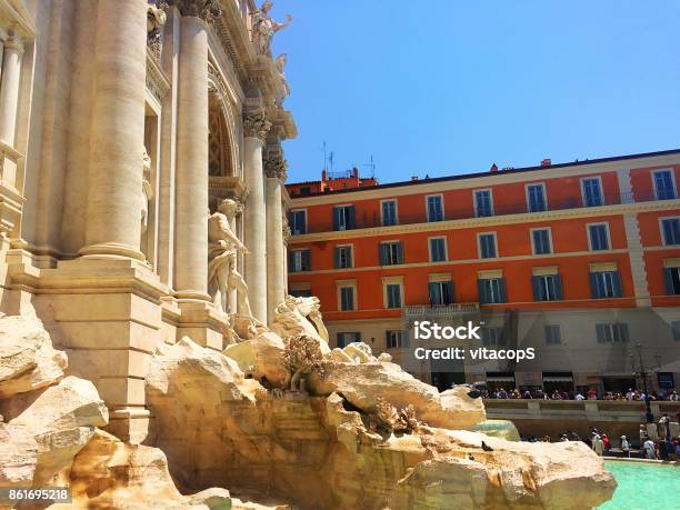 The Famous Trevi Fountain Adjacent To The Facade Of Palazzo Poli Rome Italy Stock Photo - Download Image Now