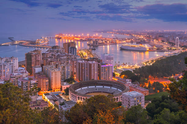 Evening view over Malaga Evening view over Málaga on the southern spanish coast. málaga province photos stock pictures, royalty-free photos & images