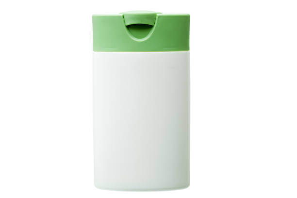 istock white plastic bottle with green cover isolated. 861703298