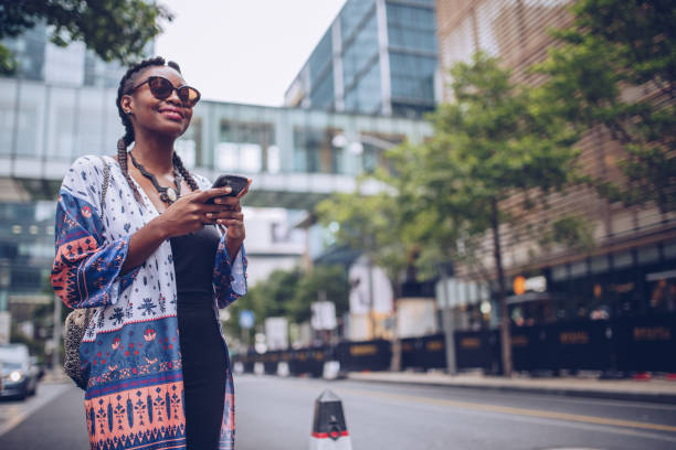istock Girl texting on the street 861705836