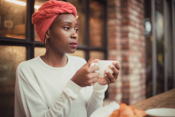 istock Girl drinking coffee in cafe 861706048