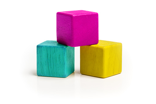 Toy Cube Blocks, CMYK Color Isolated over White Background, Three Kids Wood Toys, Cyan Magenta Yellow colors