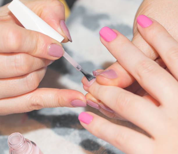 istock professional manicure in a beauty salon 861719454