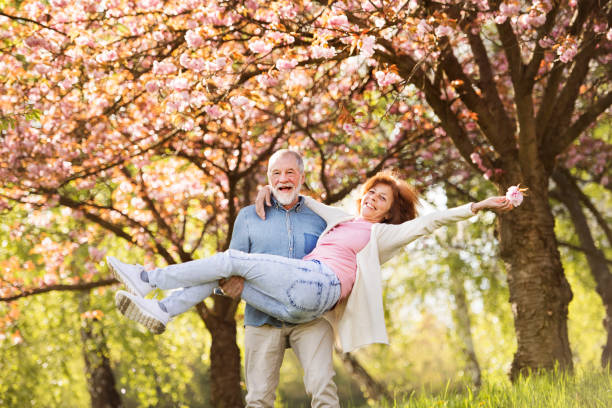 istock Senior couple in love outside in spring nature. 861719634