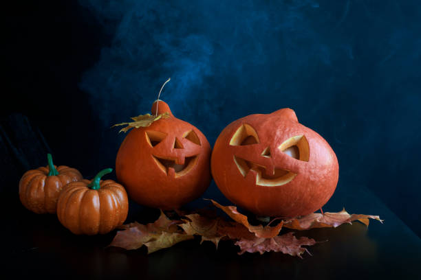istock Halloween pumpkins heads jack lantern on dark background 861725132