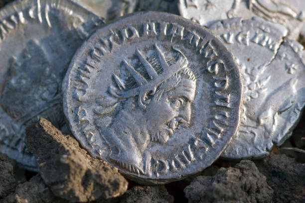 istock Roman silver coins covered in dirt 861725260