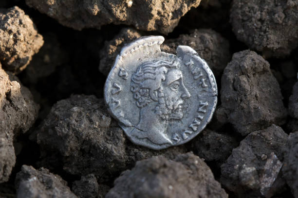 istock Roman silver coins covered in dirt 861729632