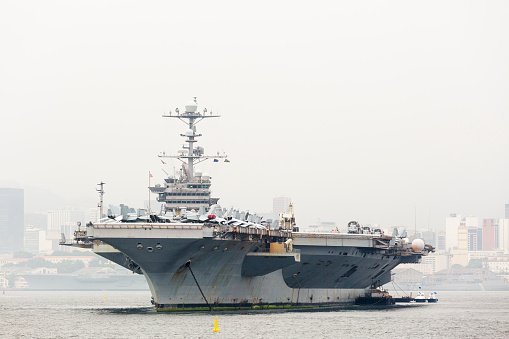 Kanagawa, Japan - June 01, 2022: United States Navy USS Abraham Lincoln (CVN-72), Nimitz-class aircraft carrier sailing in Tokyo bay.