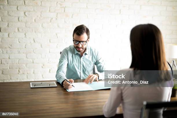 Man Interviewing A Woman For A Job Stock Photo - Download Image Now - Occupation, Working, 30-39 Years