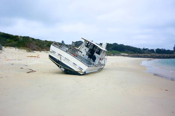 Shipwreck Shipwreck onto beach stranded stock pictures, royalty-free photos & images