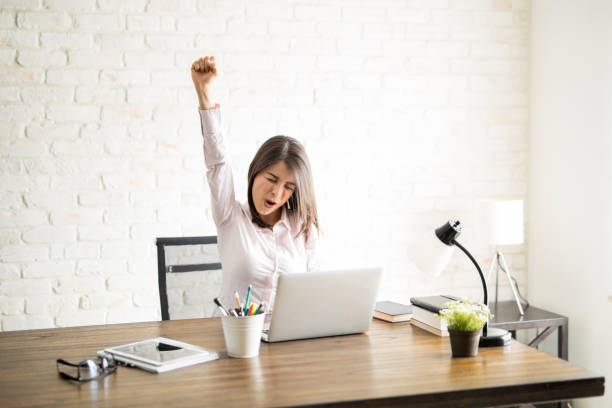 istock Excited woman in an office 861739120