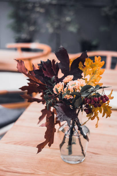 istock Autumn bouquet in a glass vase 861749850