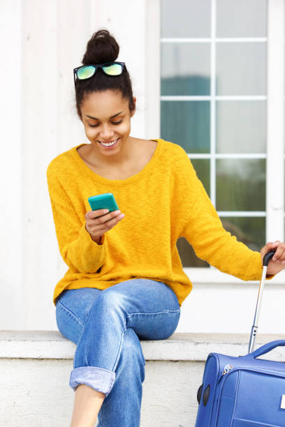 istock Female traveler using mobile phone 861761522