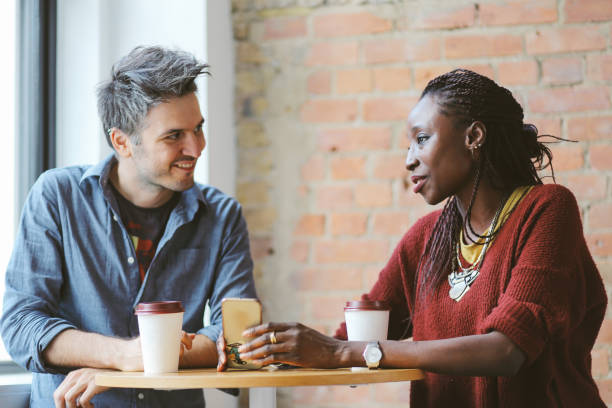 istock Young man and woman in the cafe after work 861766764