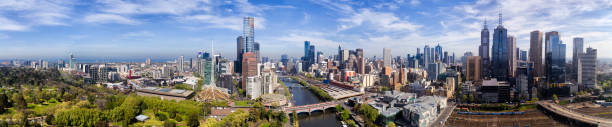 D Me CBD Day pan Wide elevated panorama of Melbourne city CBD from South Yarra to Yarra river, flinders station and train station on a sunny summer day. south yarra stock pictures, royalty-free photos & images
