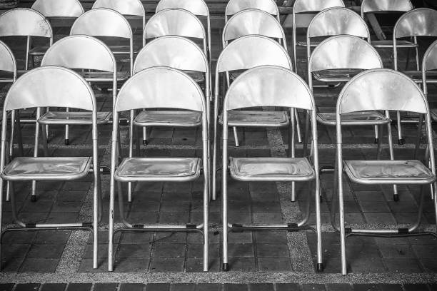istock Rows of iron chairs are set up for an outdoor performance 861794810
