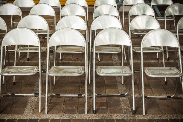 istock Rows of iron chairs are set up for an outdoor performance 861794976