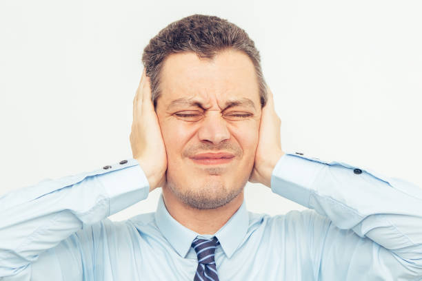 istock Tensed Middle-aged Business Man Covering Ears 861814068