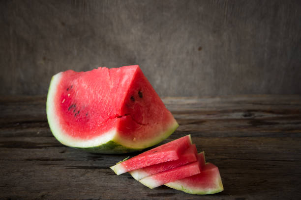 istock Watermelon on the wooden background. Organic watermelon 861817352
